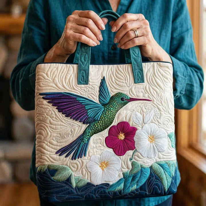 Tilkkukassi – kolibri ja valkoinen kukka